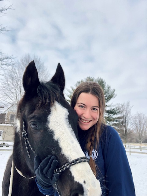 A horse nuzzles Boriana