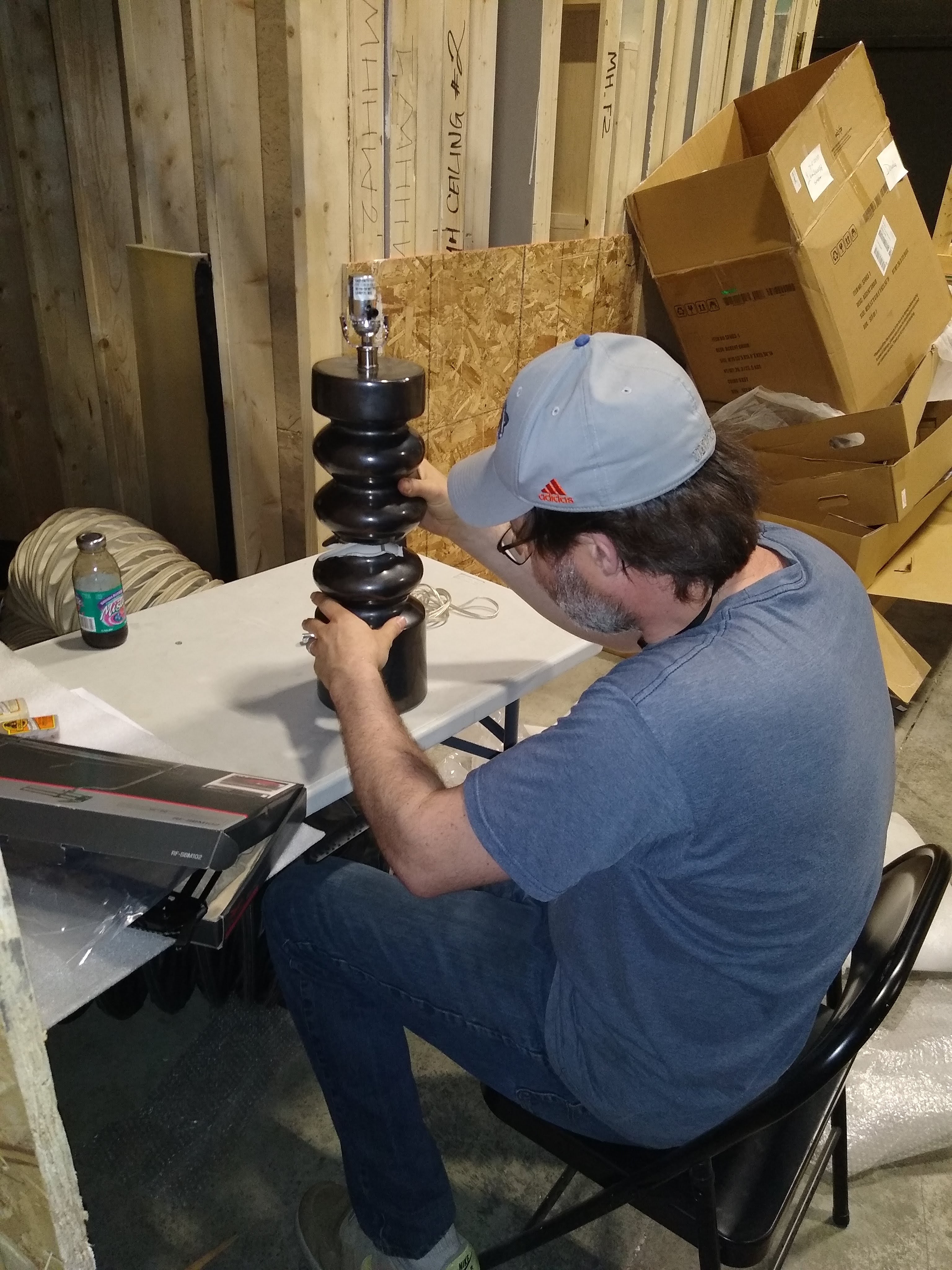 Keith Evers, a 2004 Moody Bible Institute graduate, at work as a set dresser in the Chicago TV and film industry.