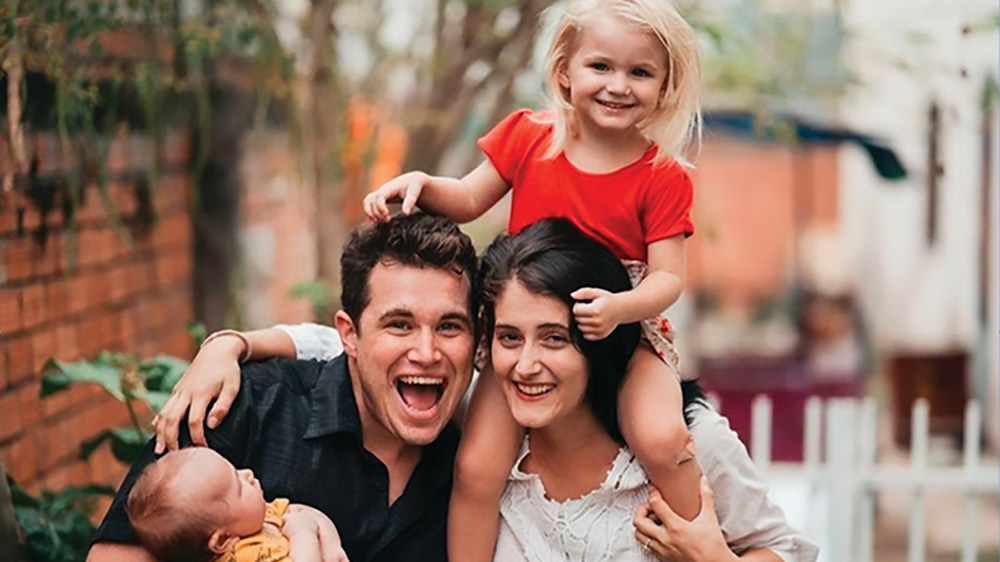 Moody Bible Institue alumni Josh Smith with wife and children