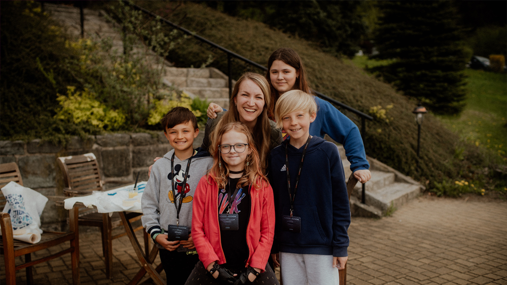 Claire Patty with a group of children