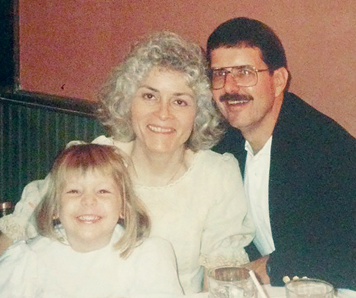 Sarah with her parents